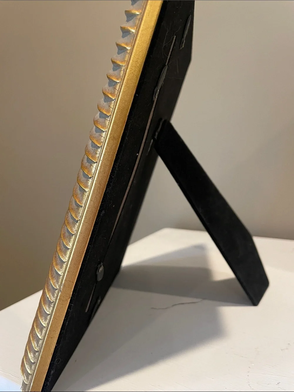 Gold detailed photo frame holds 5x7